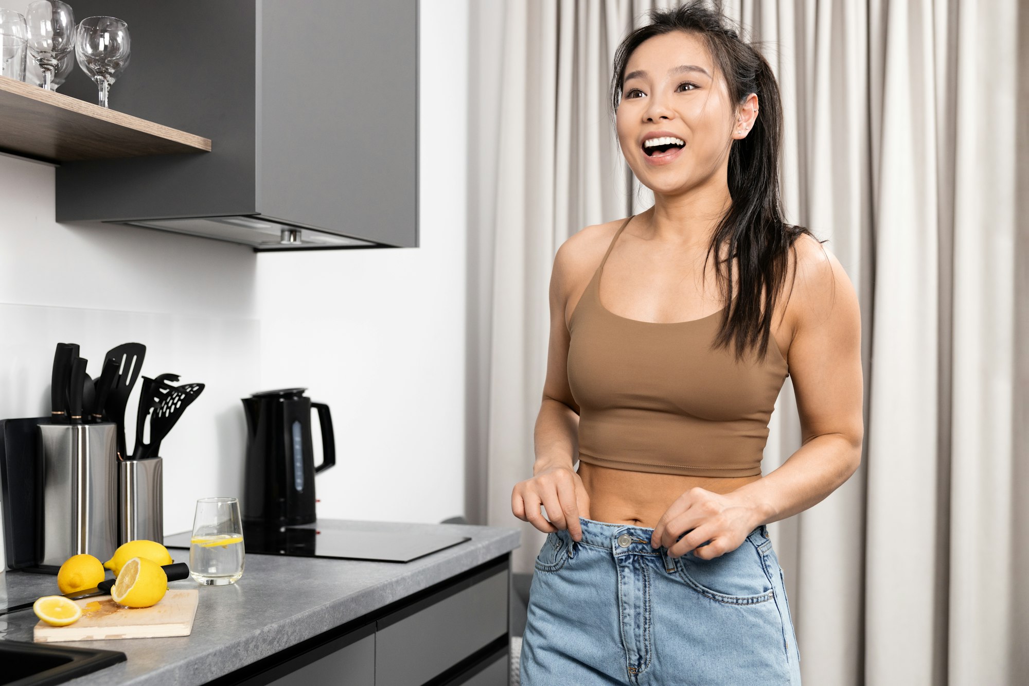 A Cheerful Woman Is Happy About Losing Weight