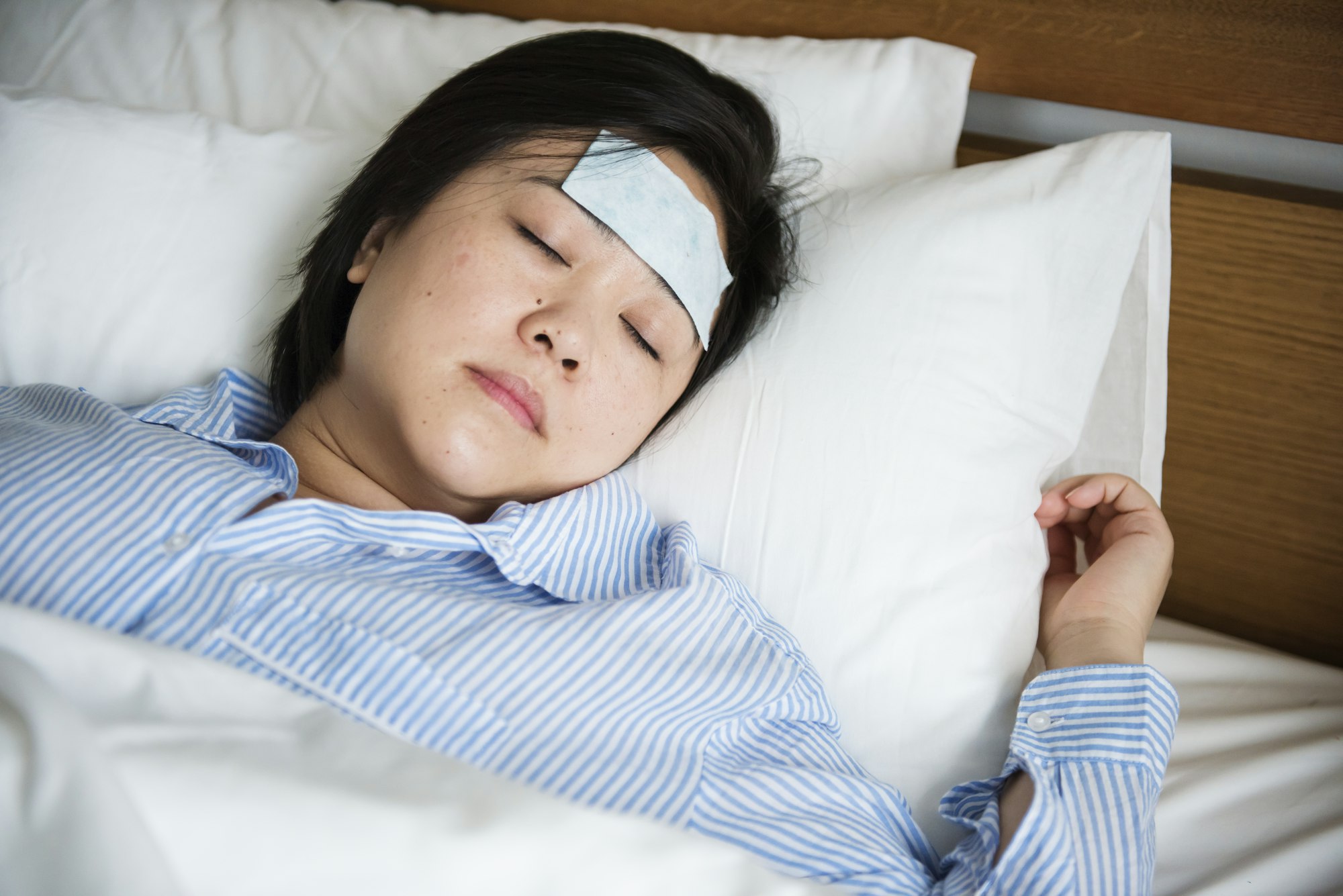 A woman suffering from fever