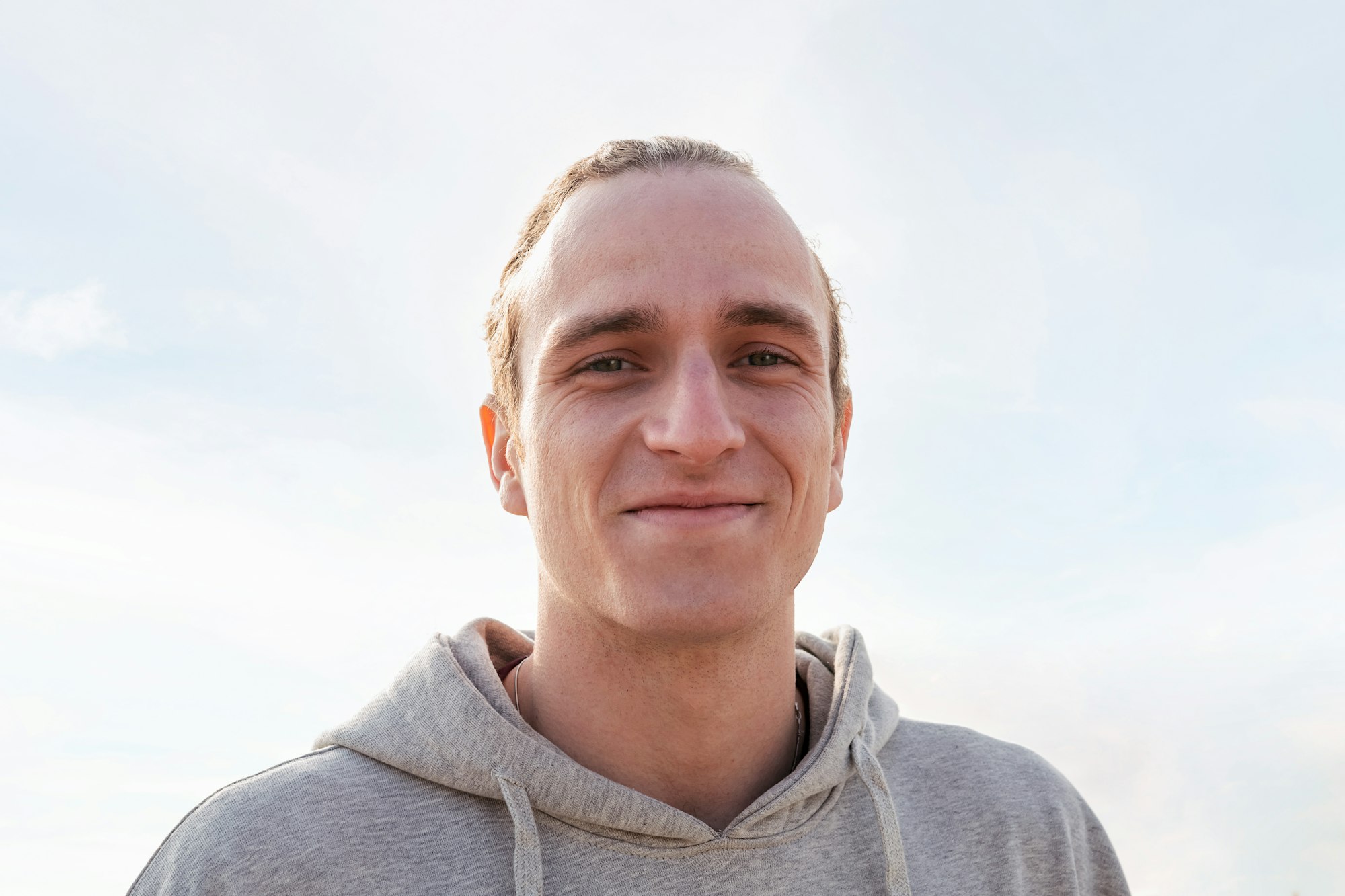 caucasian man smiling happy and looking at camera